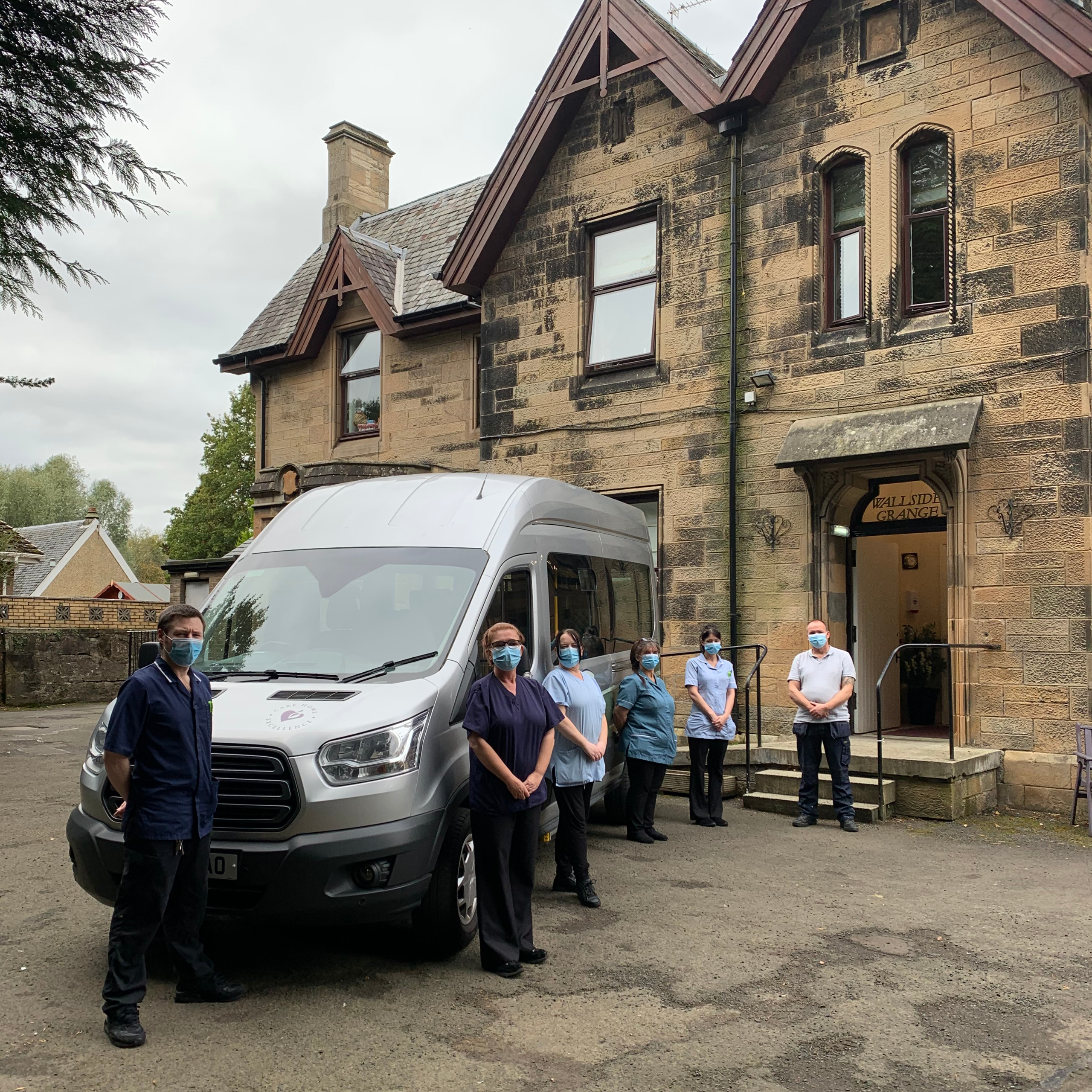 Team at Falkirk-based Wallside Grange Care Home take delivery of their new minibus